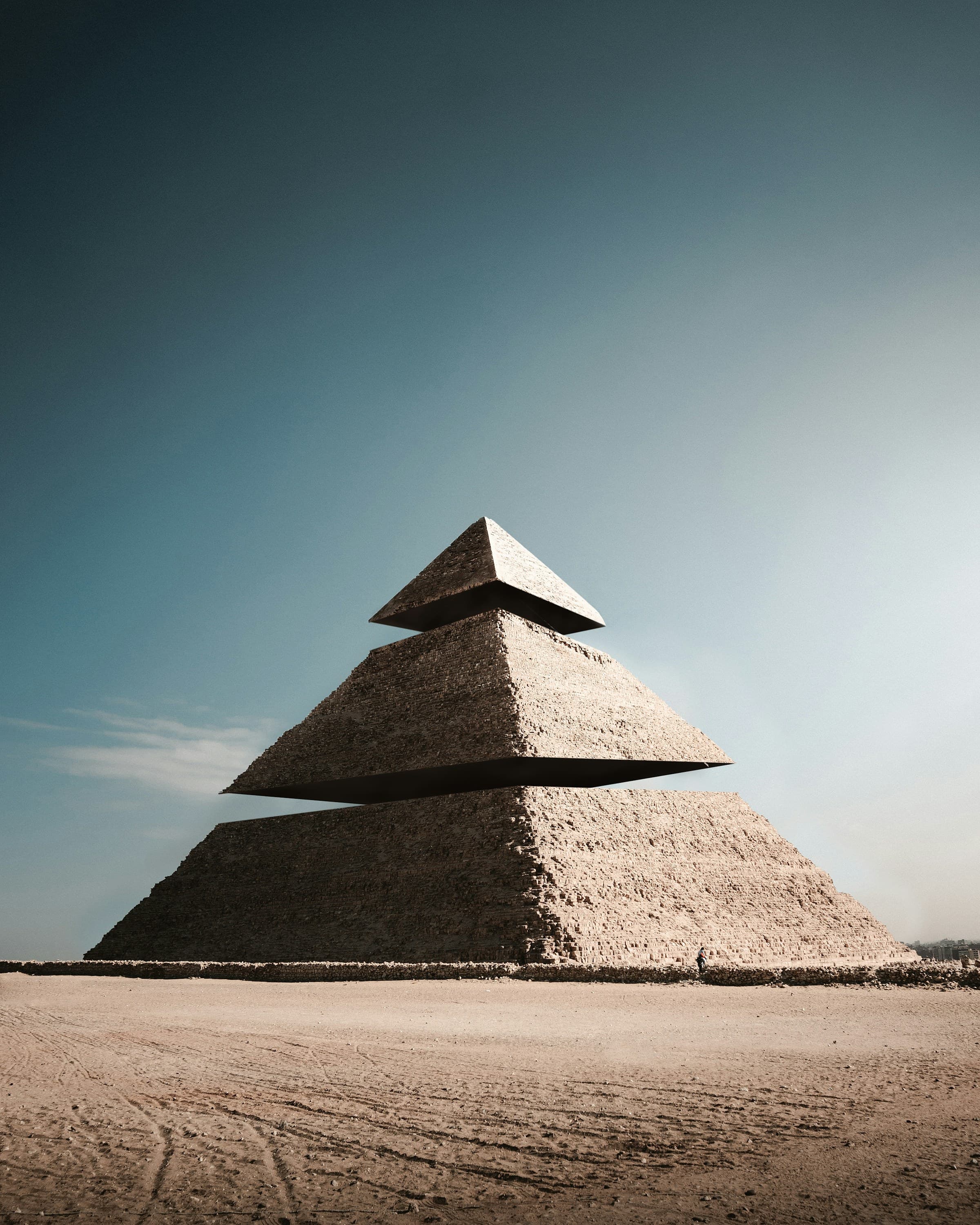 Egyptian pyramid against a clear blue sky